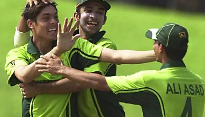 Anwar Ali celebrating with his teammates after picking a wicket.