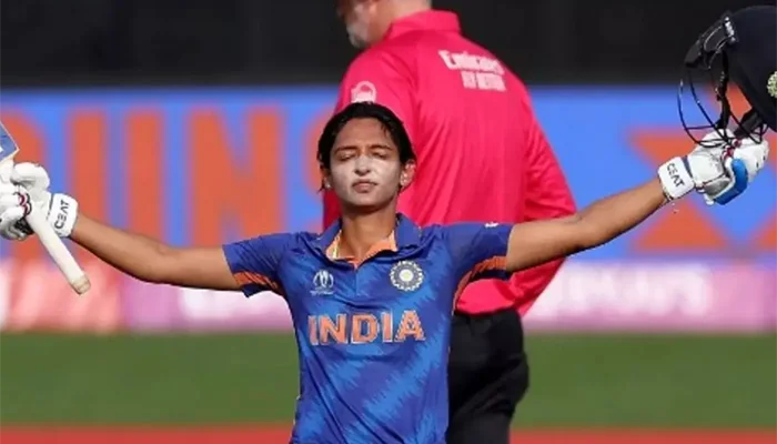 Harmanpreet Kaur celebrating after hitting a hundred.