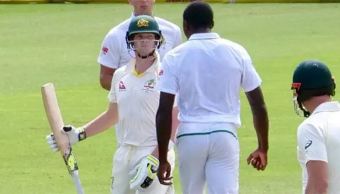 Kagiso Rabada delivers an aggressive send-off to Steven Smith, igniting tensions.