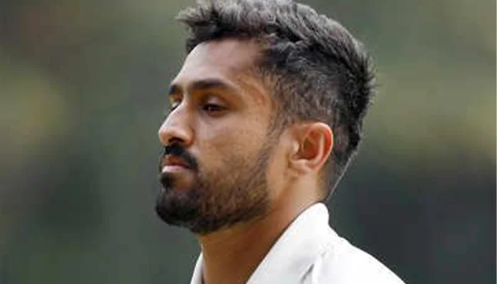 Karun Nair disappointed after being dismissed in a test match.