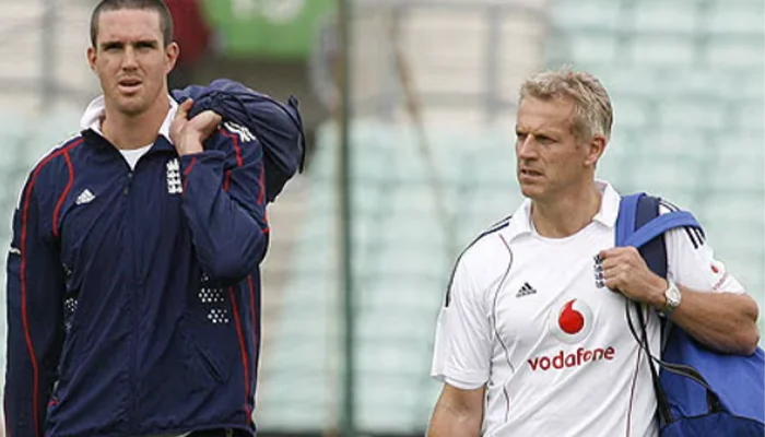 Kevin Pietersen with coach Peter Moores during a practice session.