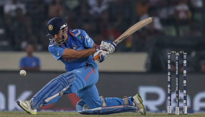 MS Dhoni struggling to hit the ball during the 2014 T20 World Cup Finals.