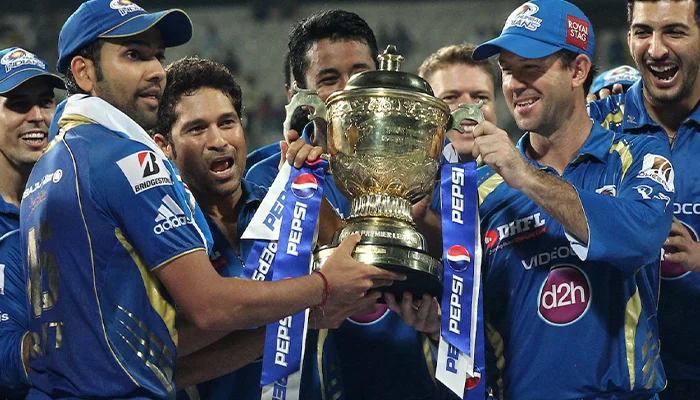 Mumbai Indians celebrating their first ever IPL Trophy under Rohit Sharma.