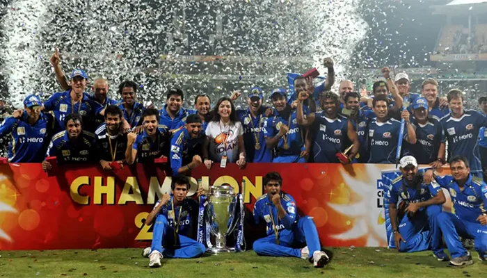 Mumbai Indians with the CLT20 2011 Trophy.