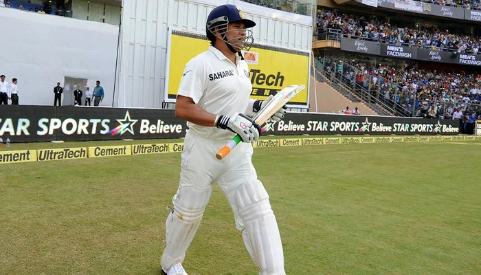 Sachin Tendulkar coming out to bat for the final time in his career.