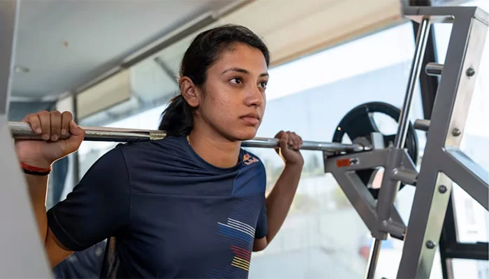 Smriti Mandhana lifting the weights at her training session.