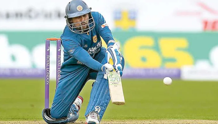 Tilakaratne Dilshan playing a scoop shot in a match.