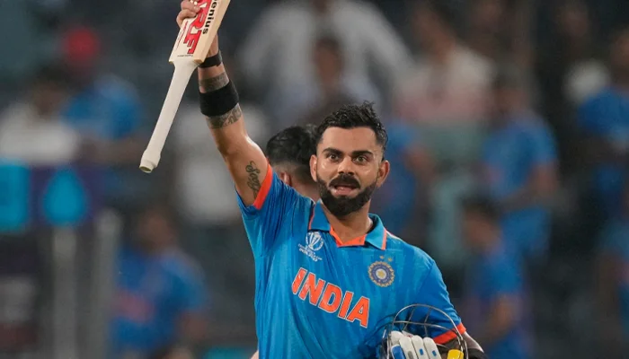 Virat Kohli celebrates after scoring his 50th century in the ODI format.