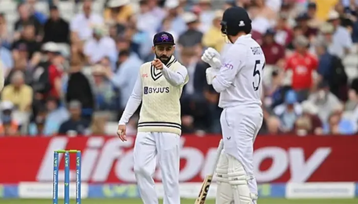 Virat Kohli engages in sledging with Jonny Bairstow during a high-stakes Test match.